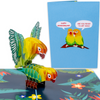 A pop-up card with two 3D parrots on a tropical background, alongside a blue cover featuring two illustrated parrots with speech bubbles saying, Happy Anniversary and Are you ready to get wild, adding a playful and romantic touch.