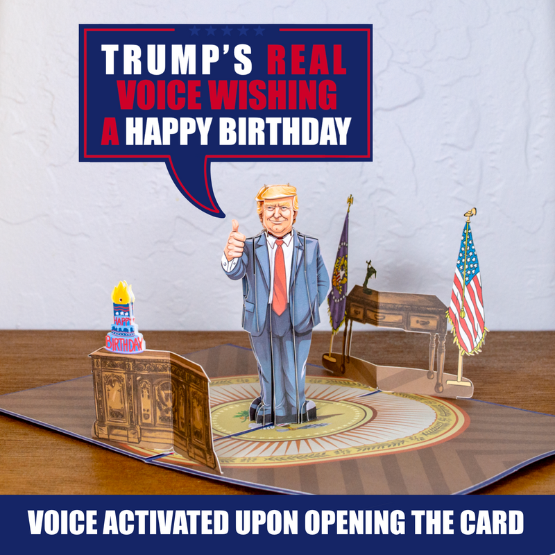 A pop-up greeting card featuring a cartoon figure resembling Donald Trump giving a thumbs-up, set in a miniature Oval Office with flags and a desk. The text above reads, Trump's real voice wishing a happy birthday, with a note stating, Voice activated upon opening the card.