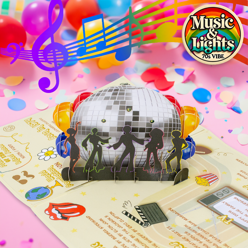 A vibrant 70s-themed birthday card with a pop-up disco ball, silhouettes of dancers, colorful balloons, and musical notes, capturing the lively retro atmosphere of a Music & Lights 70s Vibe celebration.