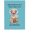 A get-well-soon greeting card featuring an illustration of a happy Labrador wearing a protective cone. The dog has a bandaged paw and sits against a light blue background. The text above reads, 'Well, at least you don’t have to wear a cone,' and below, 'Get Well Soon!' The design is humorous and uplifting