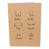 The image is of a greeting card cover featuring minimalist line drawings of breasts with different shapes, each labeled with slang terms: Boobies, Ta-Tas, Jugs, Breasts, Knockers,  and Cans, all on a light beige background.